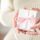 Woman hand with holiday gift box Woman hand with holiday gift box - PhotoDune Item for Sale
