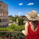 A girl on holiday in Rome visits the Colosseum. A girl on holiday in Rome visits the Colosseum. - PhotoDune Item for Sale