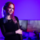 Young female gamer with colorful hair in neon lit gaming setup Young female gamer with colorful hair in neon lit gaming setup - PhotoDune Item for Sale