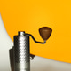 Manual Coffee Grinder Close-up. yellow background Manual Coffee Grinder Close-up. yellow background - PhotoDune Item for Sale