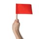 Hand holding a red flag isolated on white background. Hand holding a red flag isolated on white background. - PhotoDune Item for Sale