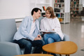 Attractive smiling happy skilled young couple of freelancers sitting at their workplace at home and Attractive smiling happy skilled young couple of freelancers sitting at their workplace at home and - PhotoDune Item for Sale