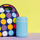 snack on a break with a lunchbox. colorful handbag, blue thermos. lunch for a schoolboy snack on a break with a lunchbox. colorful handbag, blue thermos. lunch for a schoolboy - PhotoDune Item for Sale