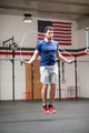 Fit athletic young man using a skipping rope Fit athletic young man using a skipping rope - PhotoDune Item for Sale