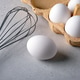 Eggs and Whisk on Kitchen Counter for Baking Preparation Eggs and Whisk on Kitchen Counter for Baking Preparation - PhotoDune Item for Sale