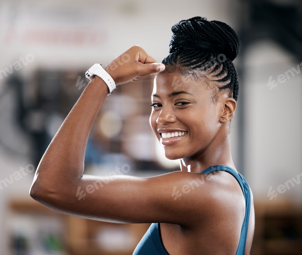 Portrait, fitness or black woman flexing muscle or body goals in