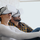 Young Couple Playing With Virtual Reality Young Couple Playing With Virtual Reality - PhotoDune Item for Sale