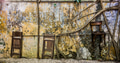 Wooden chair hanging on the old wall Wooden chair hanging on the old wall - PhotoDune Item for Sale