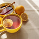 Flat Lay with Lemon Tea and Honey on Light Table under Sun Light Flat Lay with Lemon Tea and Honey on Light Table under Sun Light - PhotoDune Item for Sale