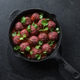 Raw ground beef meatballs in black iron pan, food preparation Raw ground beef meatballs in black iron pan, food preparation - PhotoDune Item for Sale