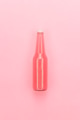 Glass Bottle Of Pink Sweet Drink Glass Bottle Of Pink Sweet Drink - PhotoDune Item for Sale