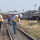 Railway Engineers Conducting Track Inspection at Rail Yard Railway Engineers Conducting Track Inspection at Rail Yard - PhotoDune Item for Sale