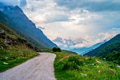Picturesque landscape with narrow road in summer mountains Picturesque landscape with narrow road in summer mountains - PhotoDune Item for Sale