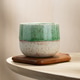 Japanese Style Ceramic Tea Cup on Wooden Coaster with Soft Natural Light Japanese Style Ceramic Tea Cup on Wooden Coaster with Soft Natural Light - PhotoDune Item for Sale