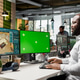 Green screen and architectural CAD software on dual monitors in creative agency Green screen and architectural CAD software on dual monitors in creative agency - PhotoDune Item for Sale