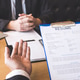Employer or recruiter holding reading a resume during about his profile of candidate Employer or recruiter holding reading a resume during about his profile of candidate - PhotoDune Item for Sale
