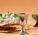 Happy Passover. Traditional Jewish menorah candlestick and matzo bread Happy Passover. Traditional Jewish menorah candlestick and matzo bread - PhotoDune Item for Sale