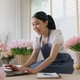 SME owner modern small flower shop work at home office happy smile SME owner modern small flower shop work at home office happy smile - PhotoDune Item for Sale
