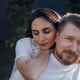 Couple enjoying a moment together outdoors, with one partner playfully embracing the other Couple enjoying a moment together outdoors, with one partner playfully embracing the other - PhotoDune Item for Sale
