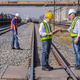 Railway Engineers Discussing Inspection Plan at Freight Yard Railway Engineers Discussing Inspection Plan at Freight Yard - PhotoDune Item for Sale