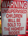 A funny warning sign. “Unsupervised children will be sold to de highest bidder” at the store. A funny warning sign. “Unsupervised children will be sold to de highest bidder” at the store. - PhotoDune Item for Sale