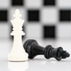 Set of Black and white chess pieces on white background Set of Black and white chess pieces on white background - PhotoDune Item for Sale