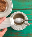 April 1st is “April Fools Day” Sugar(salt) in that coffee? Woman putting salt in sugar as a joke. April 1st is “April Fools Day” Sugar(salt) in that coffee? Woman putting salt in sugar as a joke. - PhotoDune Item for Sale