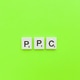 PPC scrabble letters word on a green background Stock Photo by ...