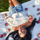 Beautiful woman with apples on grass. Beautiful woman with apples on grass. - PhotoDune Item for Sale