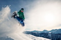 snowboarder is riding and jump from snow hill snowboarder is riding and jump from snow hill - PhotoDune Item for Sale