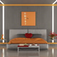 Modern master bedroom interior with orange and gray design featuring comfortable bed Modern master bedroom interior with orange and gray design featuring comfortable bed - PhotoDune Item for Sale