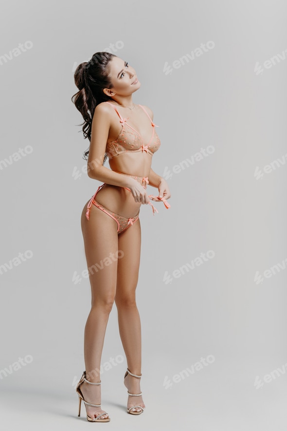 Image of dreamy sexy brunette female model with perfect body wears lace lingerie Stock Photo by StudioVK Image of dreamy sexy brunette female model with perfect body wears lace lingerie Stock Photo by StudioVK