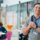 Portrait Of Smiling Male College Student In Busy Communal Campus Building Portrait Of Smiling Male College Student In Busy Communal Campus Building - PhotoDune Item for Sale