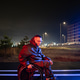 Upset young disabled man in wheelchair in rgb neon light deeply thinking, dealing with stress. Upset young disabled man in wheelchair in rgb neon light deeply thinking, dealing with stress. - PhotoDune Item for Sale