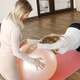 Trainer helping pregnant woman to do excercises with a fitball Trainer helping pregnant woman to do excercises with a fitball - PhotoDune Item for Sale