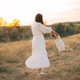 Cute young daughter on a piggy back ride with her mother. Cute young daughter on a piggy back ride with her mother. - PhotoDune Item for Sale