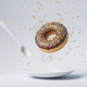 Chocolate donut with colorful sprinkles drop Chocolate donut with colorful sprinkles drop - PhotoDune Item for Sale