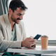 Man traveling by train using mobile phone Man traveling by train using mobile phone - PhotoDune Item for Sale