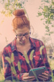 Cute hipster girl using tablet computer Cute hipster girl using tablet computer - PhotoDune Item for Sale