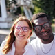 Smiling woman with glasses and man with glasses enjoying a sunny day outdoors Smiling woman with glasses and man with glasses enjoying a sunny day outdoors - PhotoDune Item for Sale