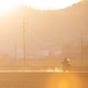 Motorcyclist riding in the sunset Motorcyclist riding in the sunset - PhotoDune Item for Sale