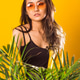 Stylish portrait of a teenager on a yellow background wearing yellow glasses Stylish portrait of a teenager on a yellow background wearing yellow glasses - PhotoDune Item for Sale