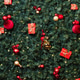 Close-up of a decorated Christmas tree with red and gold ornaments Close-up of a decorated Christmas tree with red and gold ornaments - PhotoDune Item for Sale