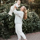 Happy mother holding baby 1 year old wearing knitted sweaters Happy mother holding baby 1 year old wearing knitted sweaters - PhotoDune Item for Sale