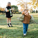 Funny smiling child girls having un in park over autumn nature background. Funny smiling child girls having un in park over autumn nature background. - PhotoDune Item for Sale
