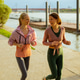 Running along the river with friends in the evening sun Running along the river with friends in the evening sun - PhotoDune Item for Sale