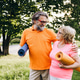 Senior couple sharing an active wellness lifestyle outdoors Senior couple sharing an active wellness lifestyle outdoors - PhotoDune Item for Sale
