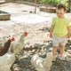 Toddler Exploring Farm Animals During Outdoor Adventure Toddler Exploring Farm Animals During Outdoor Adventure - PhotoDune Item for Sale