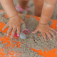 Toddler Hands Exploring Sand During Sensory Play in Playground Sandbox Toddler Hands Exploring Sand During Sensory Play in Playground Sandbox - PhotoDune Item for Sale
