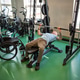 Disabled athlete strengthens body by lifting barbell in gym, healthy sports for physical progres Disabled athlete strengthens body by lifting barbell in gym, healthy sports for physical progres - PhotoDune Item for Sale